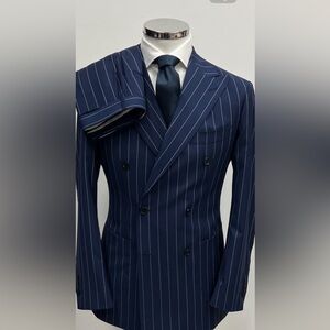 Blue pinstripes double breasted super 150 cerruti wool suit with patch pocket